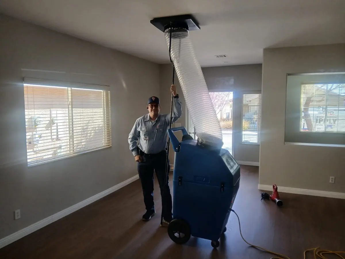 Professional Dryer Vent Cleaning work inside a Central Point home